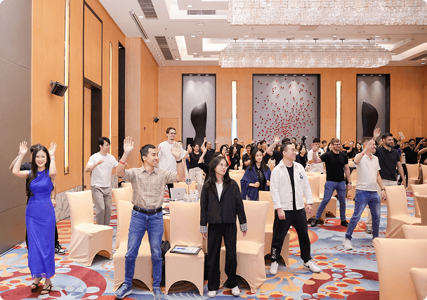 Bestfulfill workshop attendees standing in a conference room